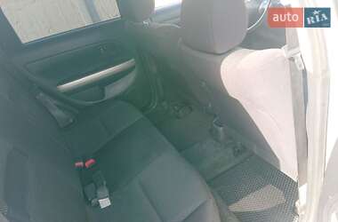 Хэтчбек Toyota XA 2004 в 