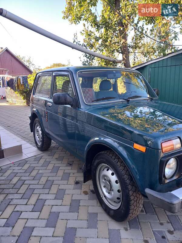 Внедорожник / Кроссовер ВАЗ / Lada 21214 / 4x4 2010 в Корсуне-Шевченковском