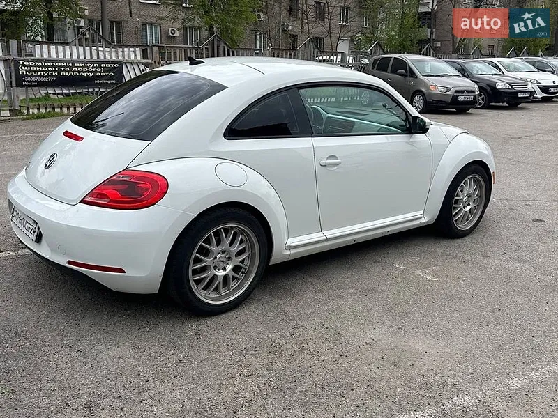 Volkswagen Beetle 2013 VIN 3VWJ07AT6EM633657 фото оголошення 8 з 63