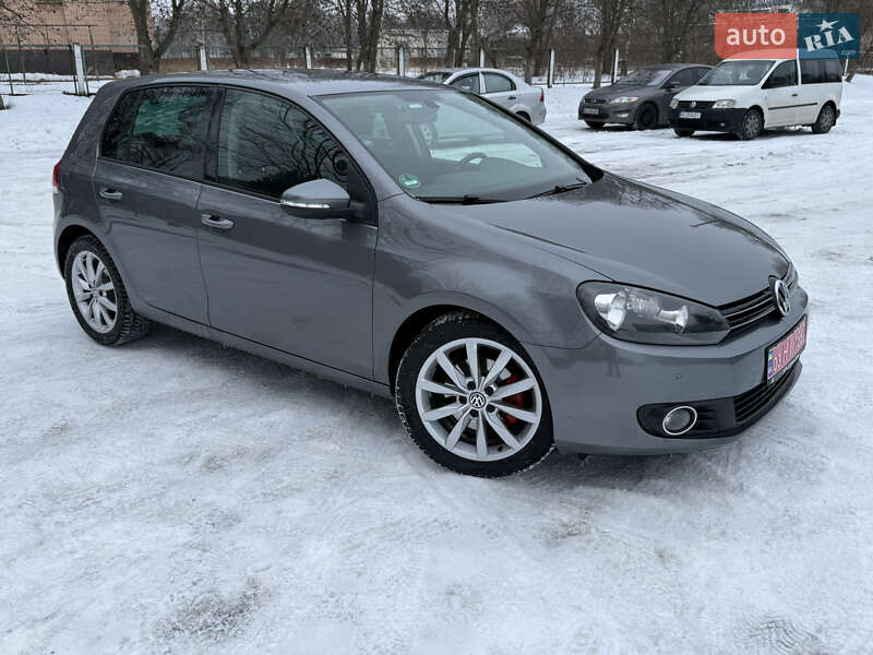 2011 Volkswagen Golf, VIN WVWZZZ1KZBW237593:plate — фото 1 (autoria)