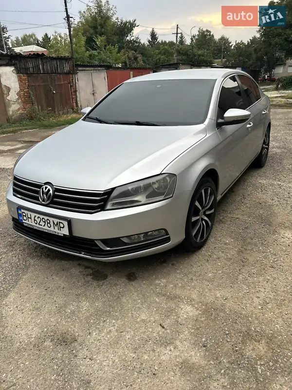 Volkswagen Passat 2013 VIN WVWZZZ3CZEP004099 фото оголошення 2 з 50