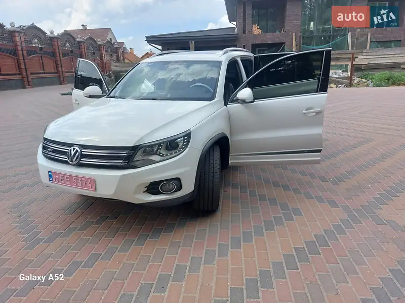 Volkswagen Tiguan 2013 VIN WVGAV3AX1EW038579 фото оголошення 5 з 73