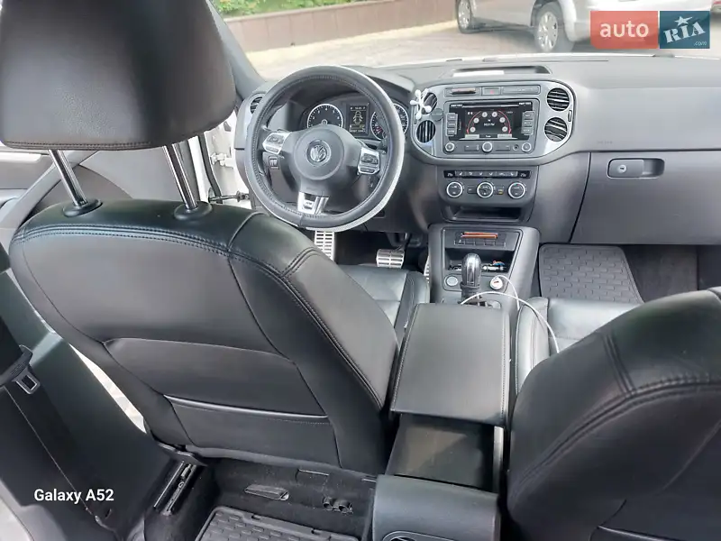 Volkswagen Tiguan 2013 VIN WVGAV3AX1EW038579 фото оголошення 2 з 73