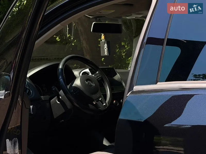Volkswagen Tiguan 2013 VIN WVGBV3AX9EW541104 фото оголошення 14 з 77