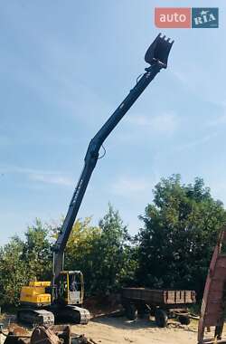 Гусеничный экскаватор Volvo EC 210B LC 2002 в 