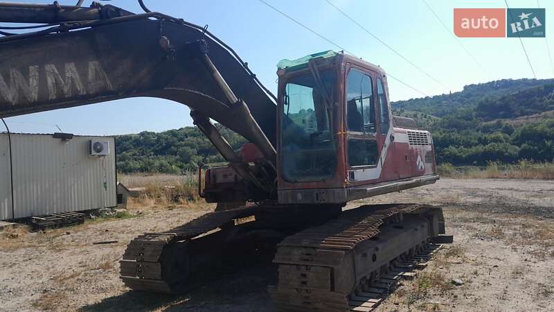 Экскаватор погрузчик Volvo EC 240 BNLC 2005 в 