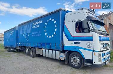 Тентований Volvo FH 12 2003 в 