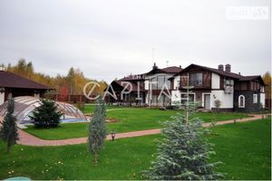 Продается дом на 2 этажа 351 кв. м с гаражом