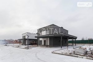 Продается дом на 2 этажа 470 кв. м с бассейном