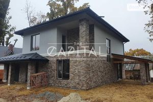 Продается дом на 2 этажа 185 кв. м с гаражом