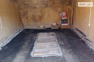 Продается место в гаражном кооперативе под легковое авто на 24 кв. м